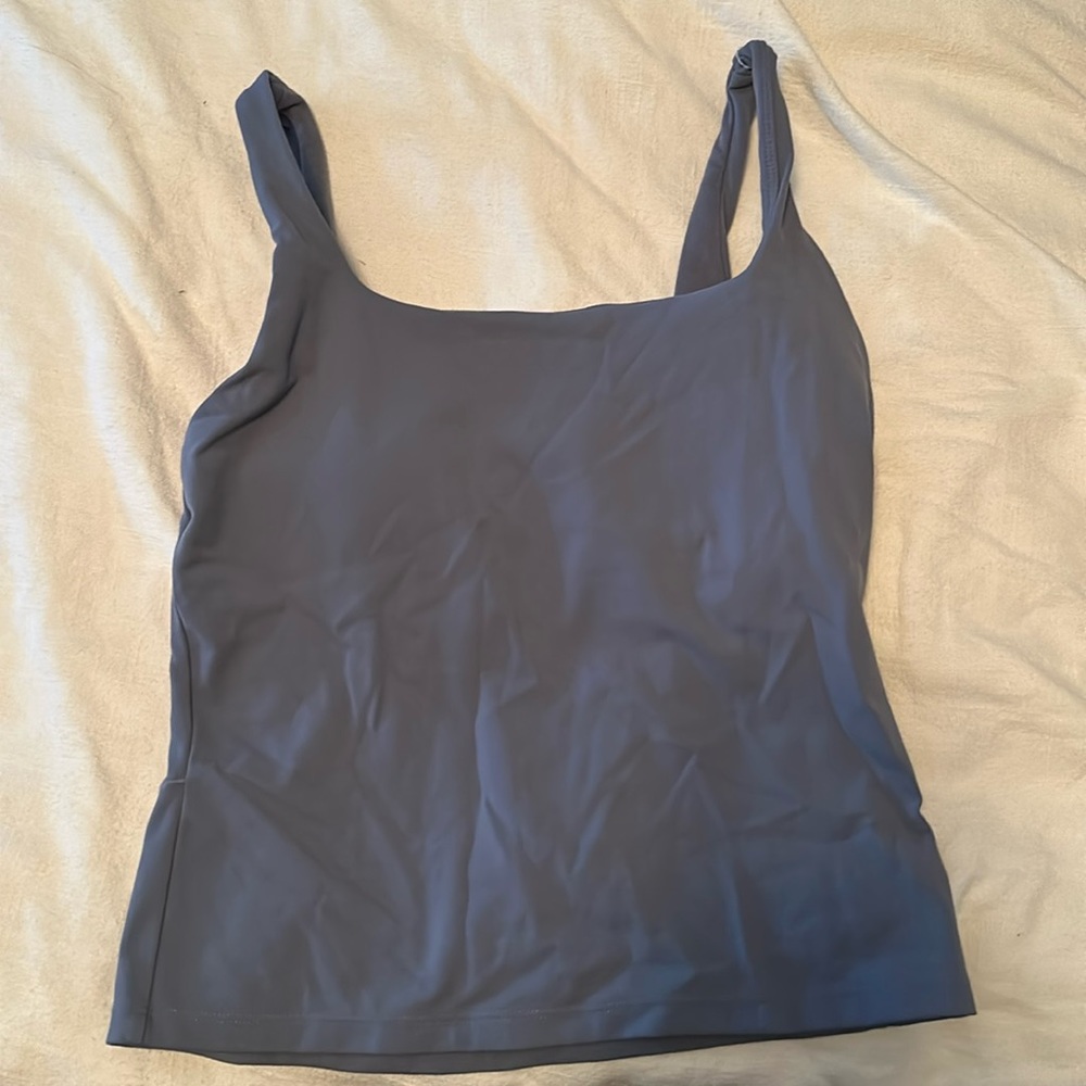 Sports tank with padded support